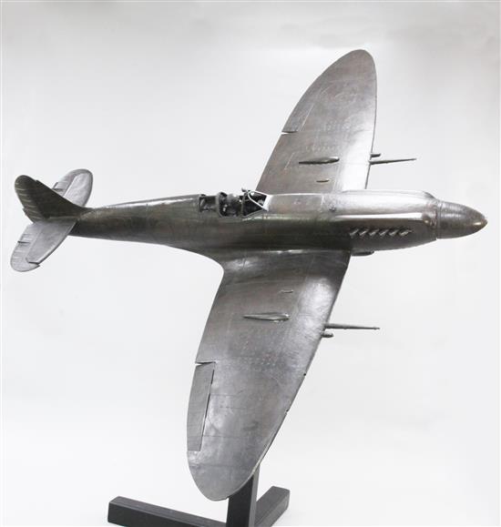 Stephen Allen. A limited edition bronze 1/5th scale model of a Mark XIVc spitfire with a wrought iron stand.